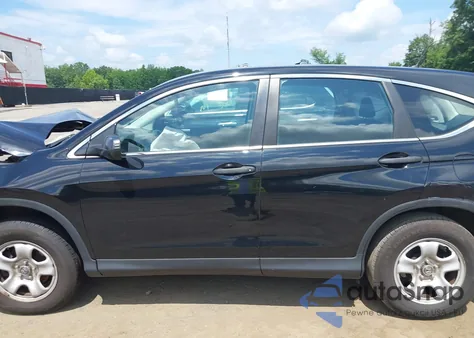 2015 Honda Cr-V Lx z USA, uszkodzony, nr VIN 5J6RM4H3XFL110802